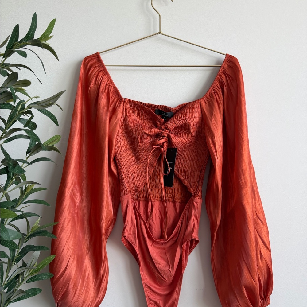 Lulu's Rust-Orange Smocked Lace-Up Long Sleeve Bodysuit